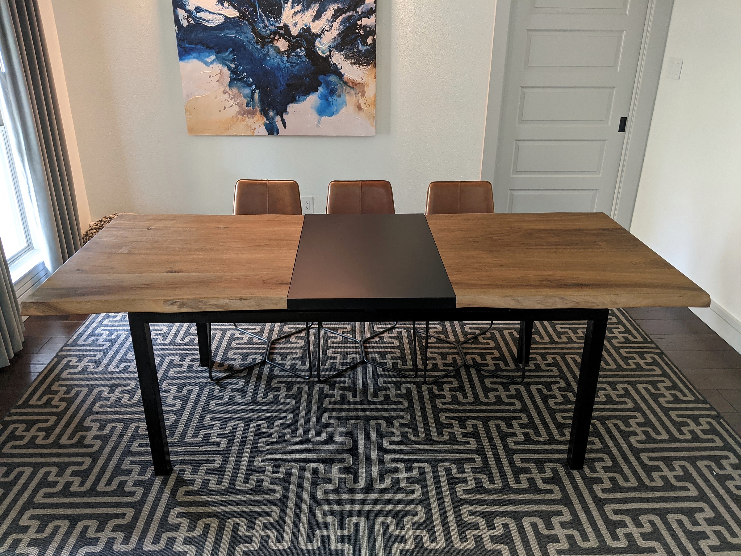 Timber dining table with dark inset